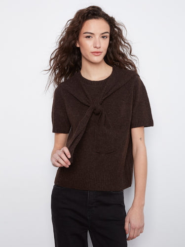Short sleeves enhance the comfortable fit of this stylish knit top, perfect for any occasion by Charlie B.