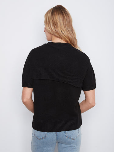 Chic black sweater with charming attached detail for added flair by Charlie B.