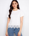 White T-shirt featuring hem embroidery and crafted from 100% cotton, ideal for casual wear by Charlie B.