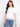 Elegant white T-shirt with crew neckline and detailed hem embroidery, perfect for everyday style by Charlie B.