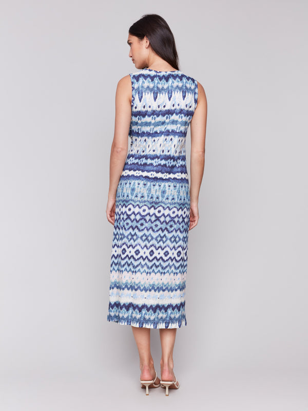Elegant midi length dress with round neck and knot detail by Charlie B.