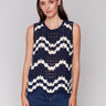 Navy crochet top with a crew neckline and scalloped hem by Charlie B.