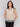 Crew neckline crochet top in natural hue by Charlie B.