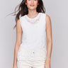 White top with intricate floral pattern by Charlie B.