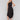 Black dress with a smocked waistband and midi length by Charlie B.