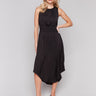 Black dress with a smocked waistband and midi length by Charlie B.