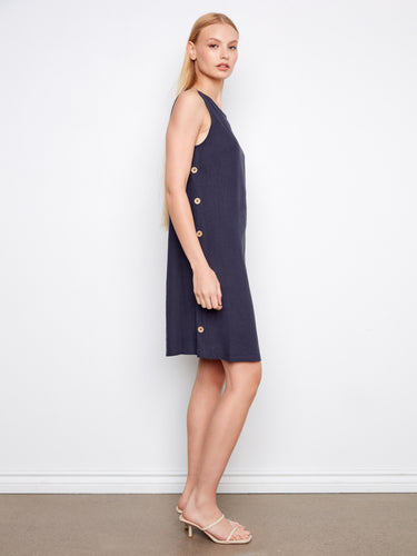 Elegant navy dress with crew neckline and stylish side button detail, offering a chic look by Charlie B.