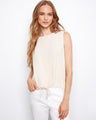 Natural linen-blend top featuring a sleeveless design and drawcord hem, perfect for layering or wearing alone by Charlie B.