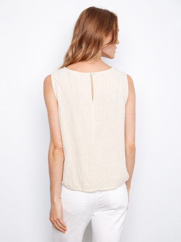 Elegant natural top with keyhole button back detail, crafted from a breathable linen blend for comfort and style by Charlie B.