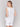 Sleeveless white top in a comfortable linen blend, perfect for layering by Charlie B.