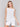 Chic white sleeveless linen blend garment ideal for casual outings by Charlie B.
