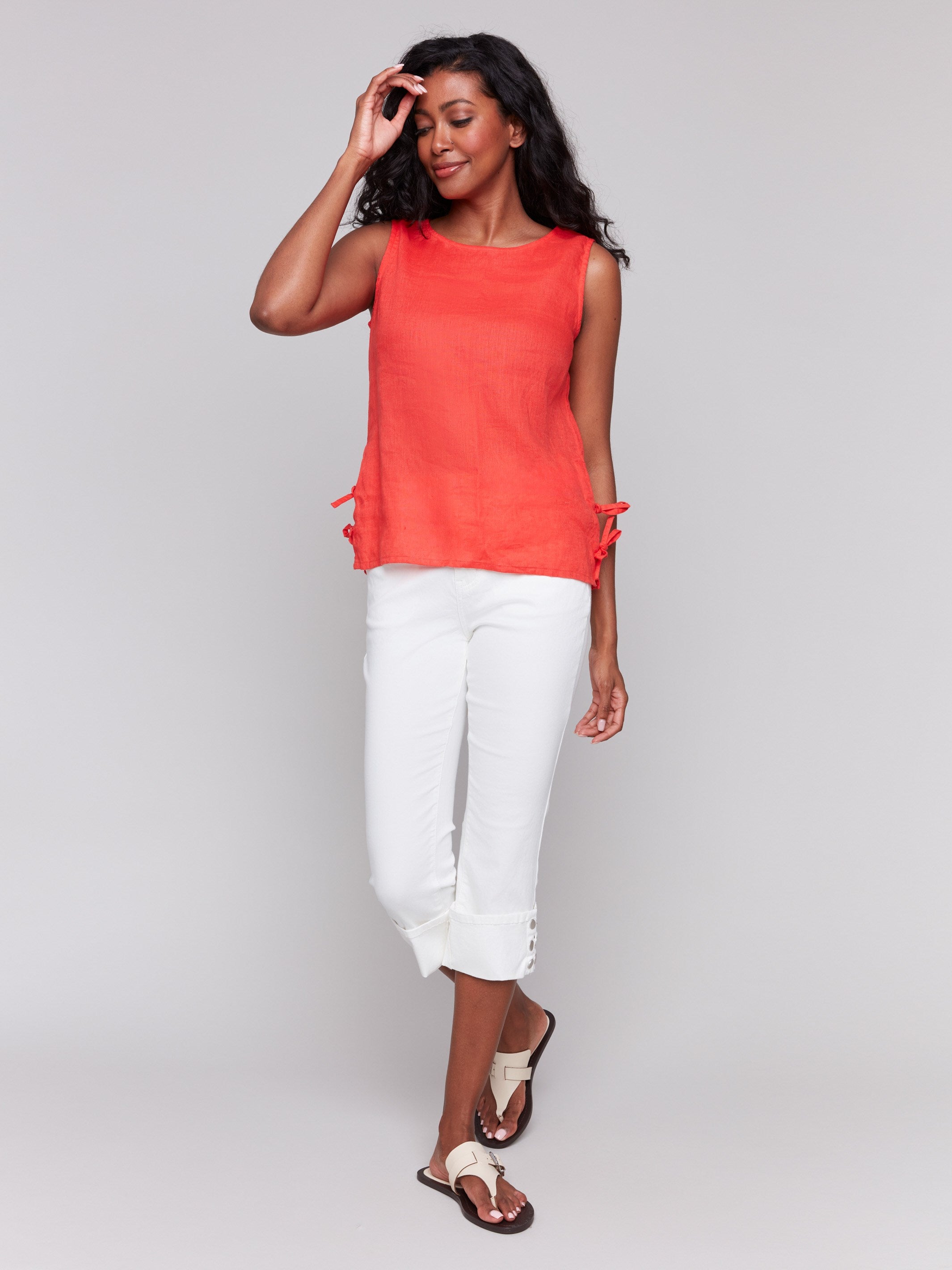 Elegant sleeveless linen blend top with chic side ties by Charlie B.
