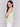 Elegant sleeveless design in a keylime hue, ideal for warm days by Charlie B.
