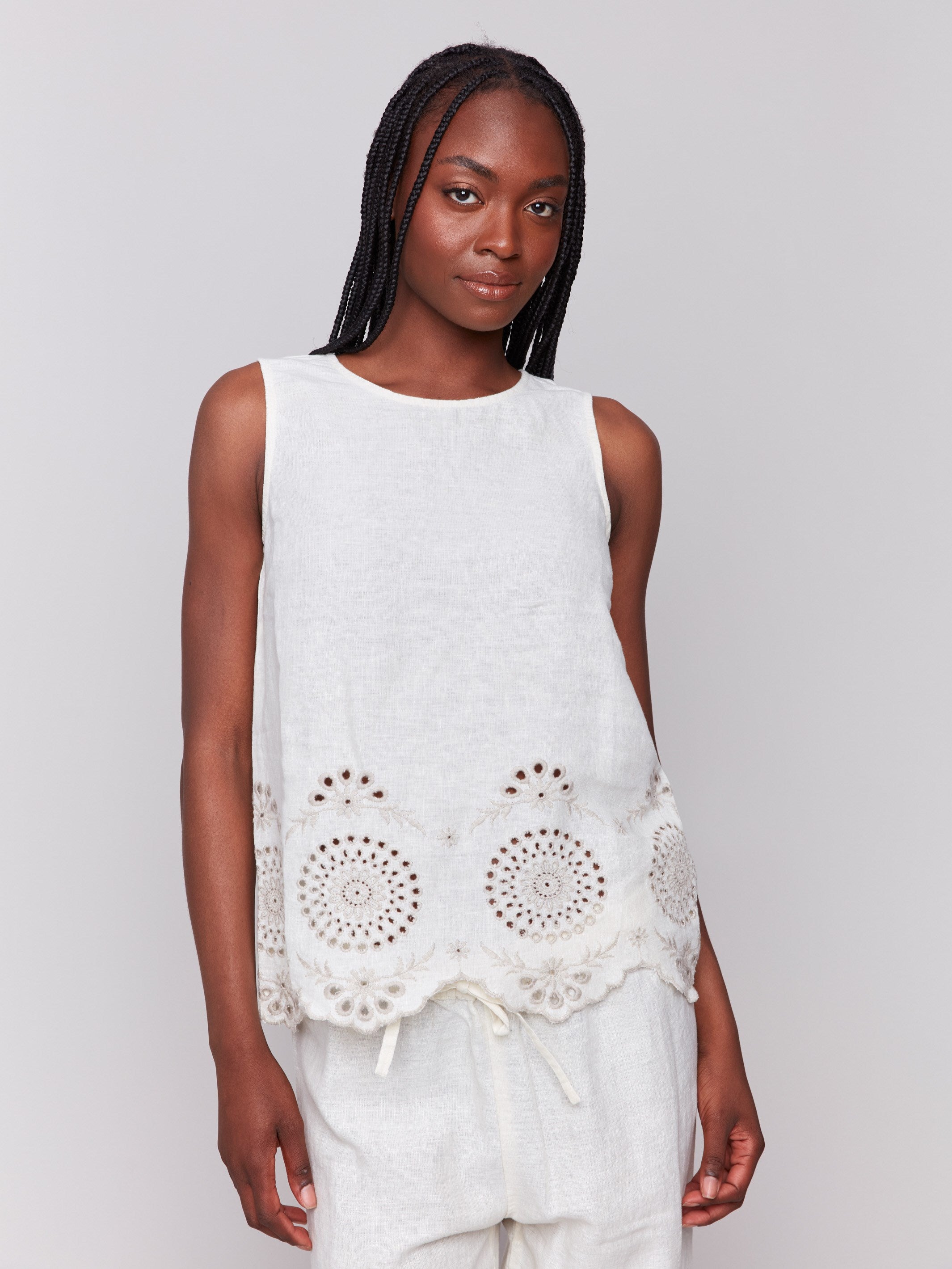 Linen top with a crew neckline and elegant design by Charlie B.