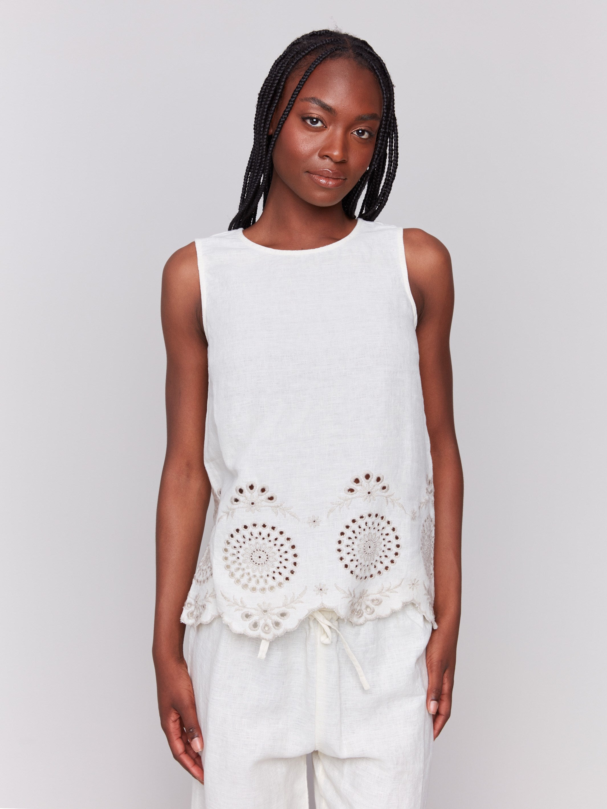 Elegant top showcasing eyelet embroidery detailing by Charlie B.