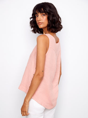 Crafted with attention to detail, the high-low hem provides a flattering silhouette that complements any figure effortlessly. By Charlie B.