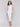 Minimalist sleeveless style in soft white linen by Charlie B.