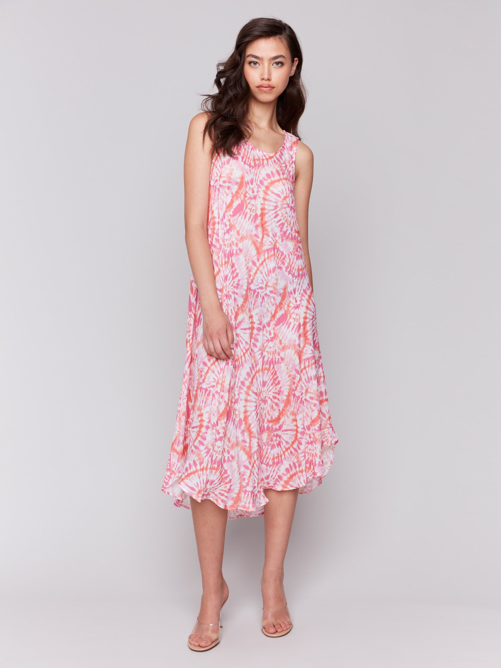 Midi-length dress featuring a sleeveless design in papaya tie-dye by Charlie B.