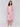 Midi-length dress featuring a sleeveless design in papaya tie-dye by Charlie B.