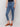 Trendy slim leg jeans in blue with unique side mini tabs detail by Charlie B.