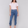 Medium blue jeans with rose detailing and stretch denim fabric by Charlie B.