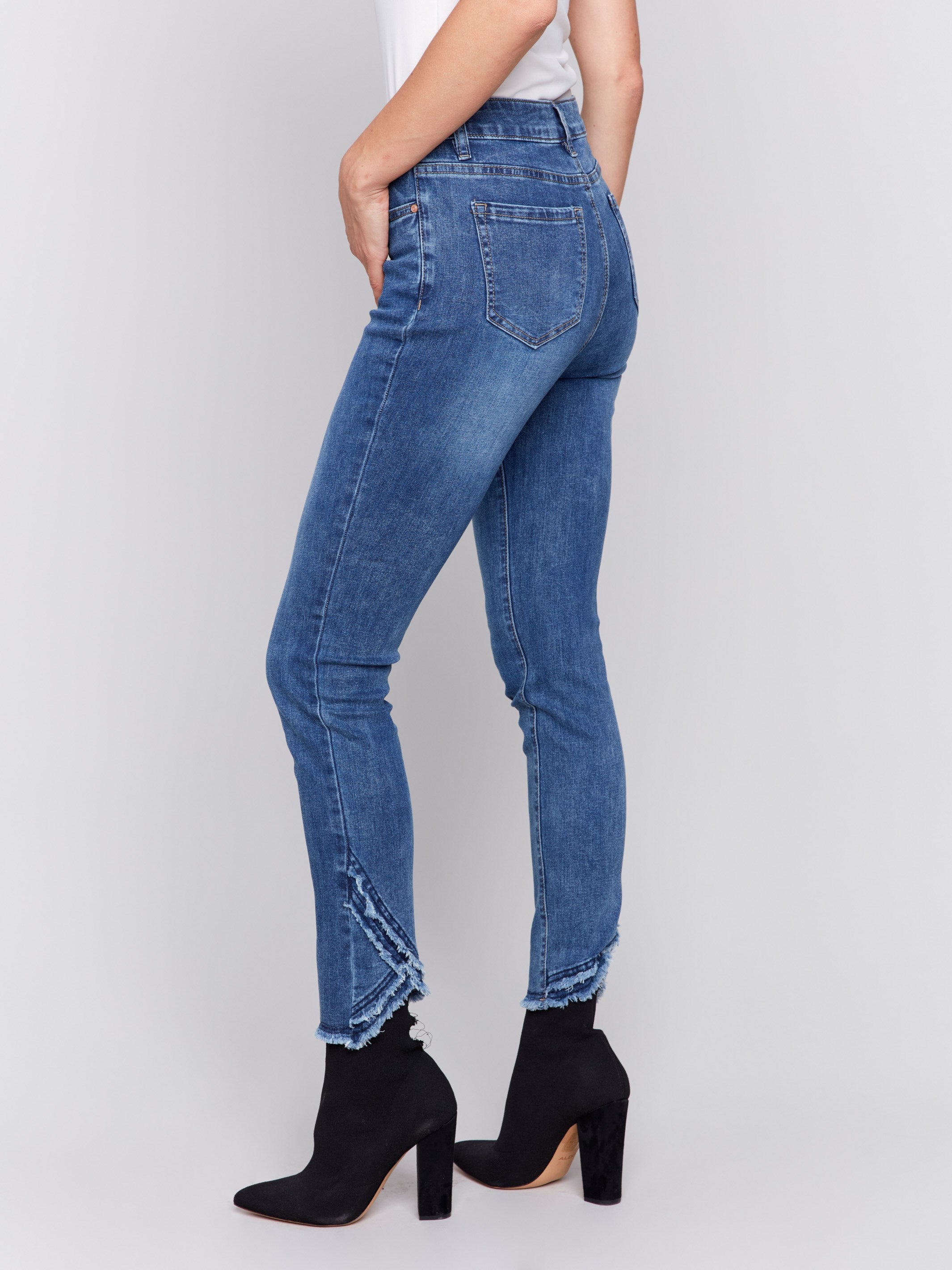 Frayed tulip hem jeans outlet