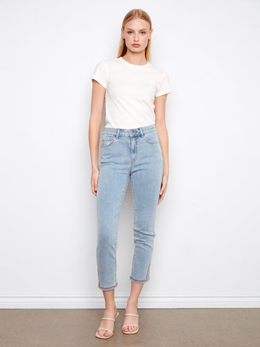 Adorned with curved embroidery, these jeans add a unique flair to any outfit. Stand out effortlessly by Charlie B.