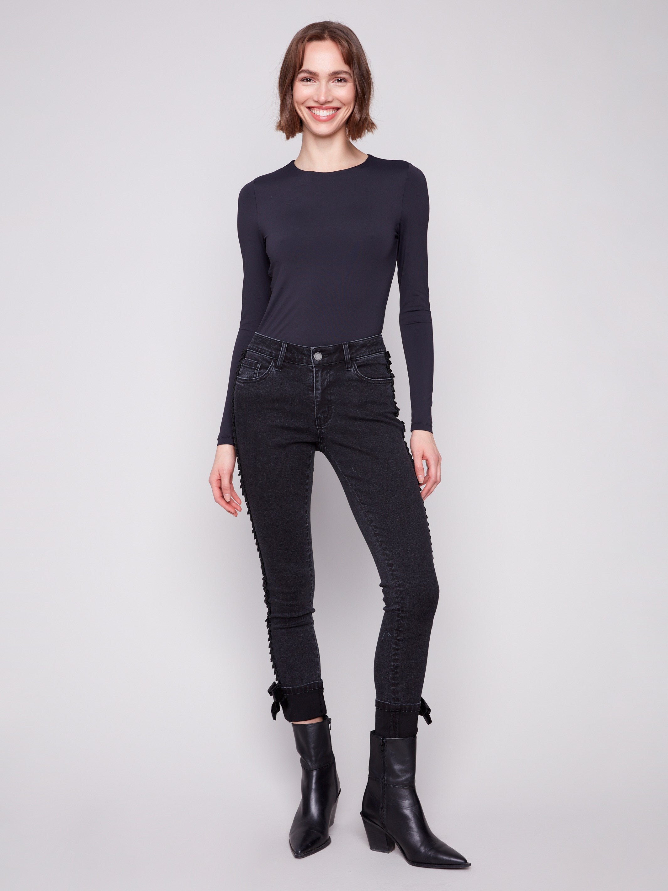 Charcoal jeans featuring a slim fit and stylish five-pocket design, perfect for versatile wear by Charlie B.