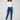 Indigo jeans in stretch denim with a slim fit and stylish velvet bow trim, perfect for any occasion by Charlie B.