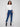 Indigo jeans in stretch denim with a slim fit and stylish velvet bow trim, perfect for any occasion by Charlie B.