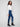 These indigo jeans feature a five-pocket design and ankle-length style, making them versatile for day or night by Charlie B.
