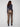 Crafted from luxurious stretch twill fabric, these copper metallic pants boast an elegant slim fit design by Charlie B.