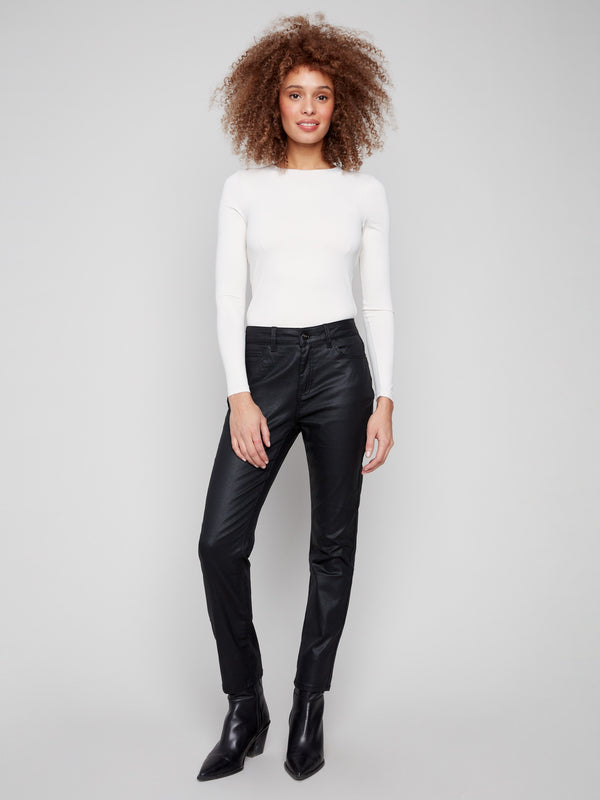 Black pants with a slim fit and ankle-length cut in stretch twill fabric by Charlie B.