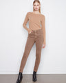 These pants feature a slim leg design, offering a sleek and modern fit by Charlie B.
