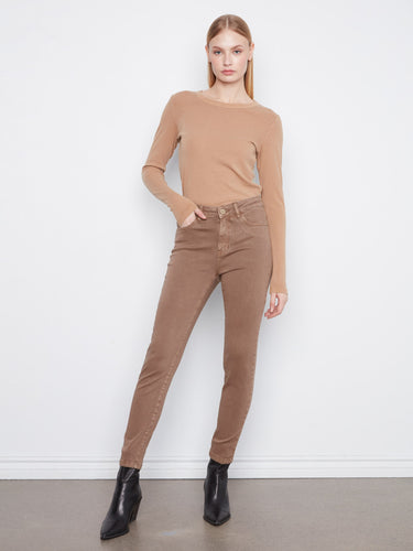 These pants feature a slim leg design, offering a sleek and modern fit by Charlie B.