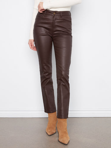 Stretch twill fabric in coffee color pants paired elegantly with a white top and boots by Charlie B.