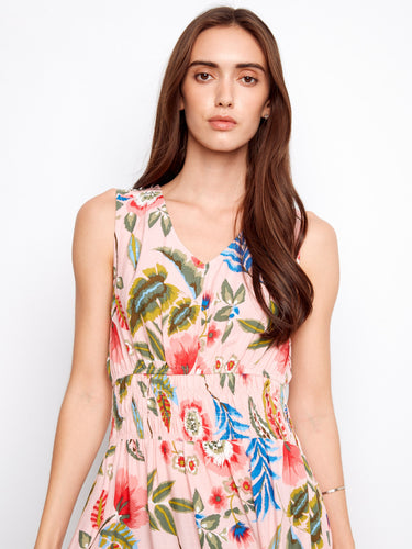 This dress features a smocked waist, enhancing the silhouette beautifully. Ideal for casual or formal settings by Charlie B.