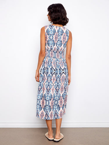 With its graceful midi length, this dress offers a sophisticated silhouette that's ideal for various occasions. By Charlie B.