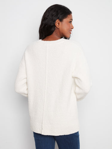 Ecru boucle sweater with drop shoulder styling, creating an effortlessly chic look that's both comfortable and fashionable by Charlie B.