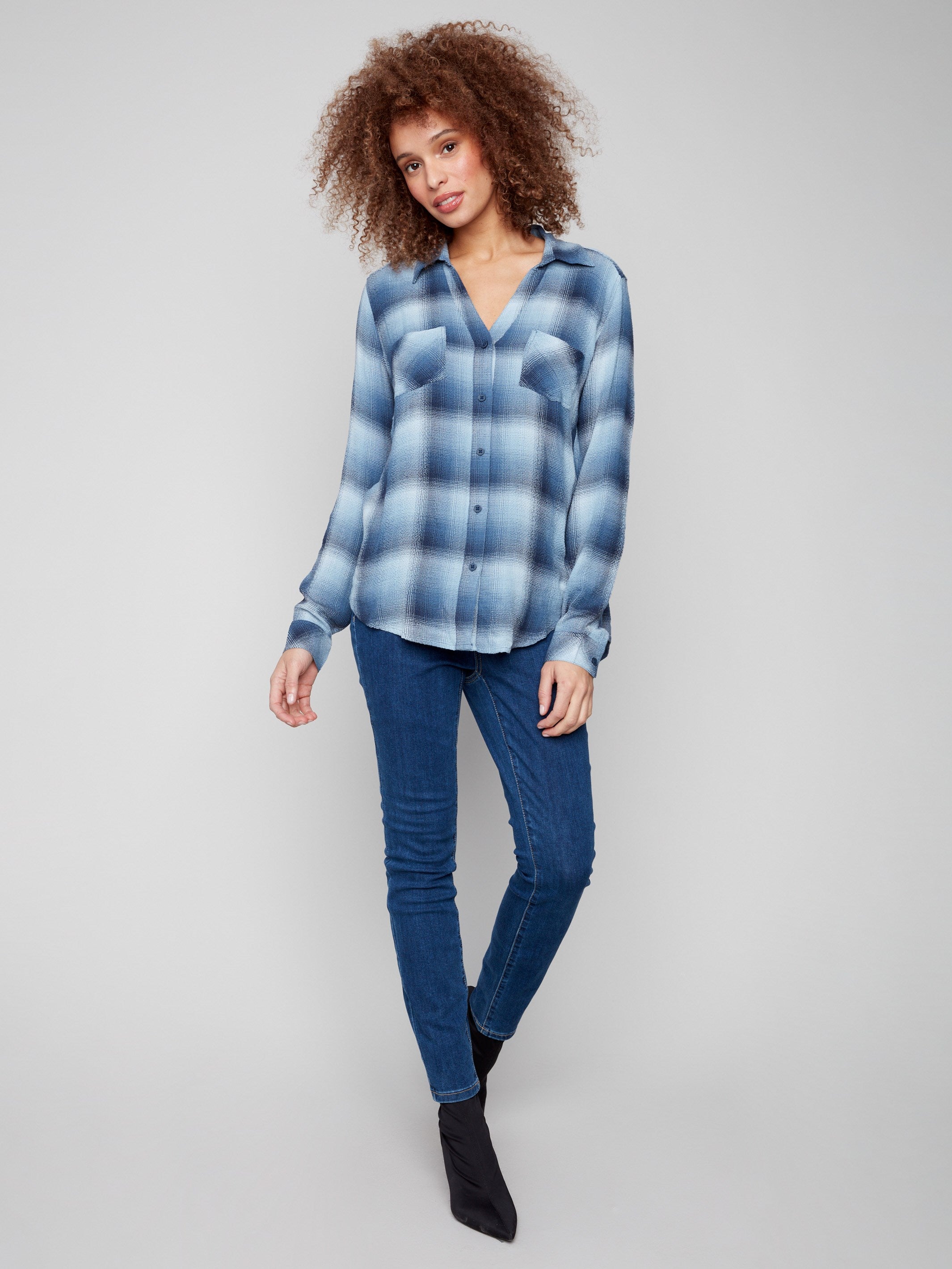 Stylish plaid blouse with long sleeves, perfect for layering in cooler weather by Charlie B.