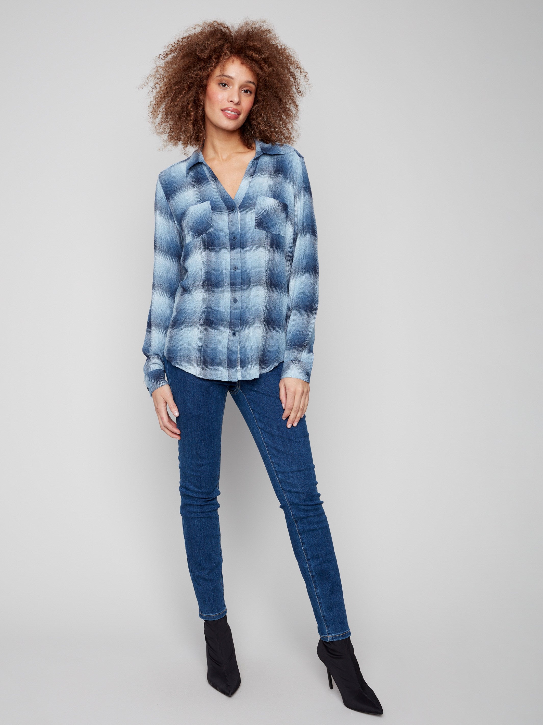 Elegant design with two chest pockets offering both function and fashion by Charlie B.