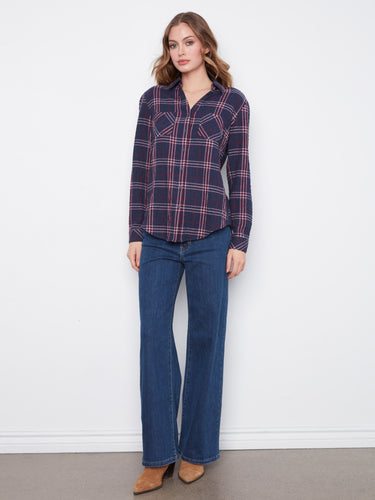 Stylish long-sleeve blouse with chest pockets, adding functionality to its chic design by Charlie B.