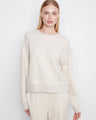 Soft scuba fabric sweatshirt with a crew neck and long sleeves, offering a relaxed fit. Designed by Charlie B.