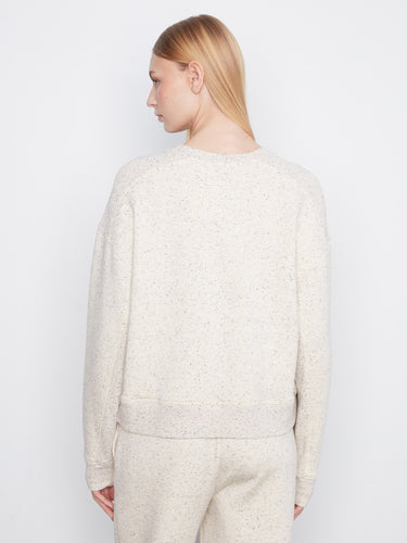 Ribbed cuffs and hem add detail to this relaxed fit top in soft scuba fabric, perfect for any casual day. By Charlie B.