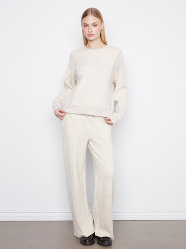 Designed for comfort, this long sleeve top showcases a crew neck with elegant ribbed details throughout. By Charlie B.