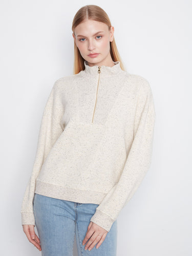This stylish top showcases long sleeves that are perfect for layering during transitional weather seasons. By Charlie B.