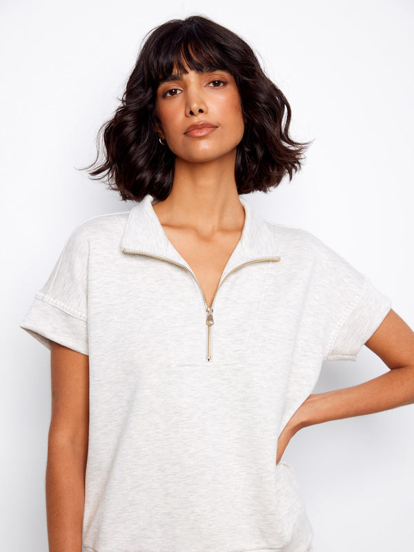 Heather light grey top with distinctive short sleeves and a mock neckline, offering a modern touch by Charlie B.