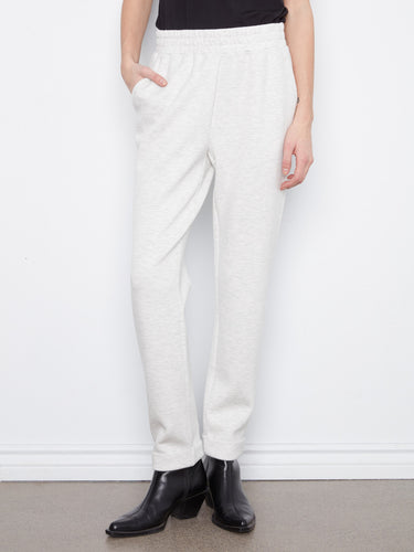 These jogger pants in heather-light grey offer a full-length design with convenient slash pockets, ideal for everyday style by Charlie B.