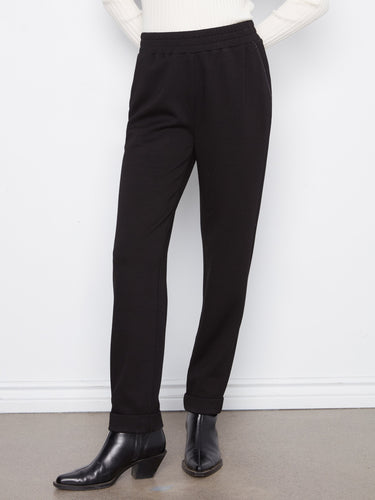 Crafted from stretch fabric, these pants provide comfort and flexibility for all-day wear by Charlie B.