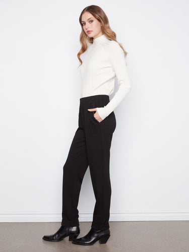 Designed with slash pockets, these pants combine style and practicality seamlessly by Charlie B.